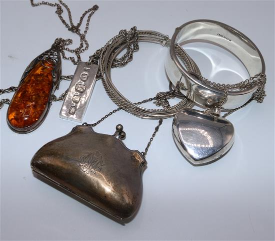 Silver purse, amber pendant, etc